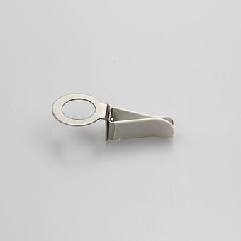 a small metal clip with a ring on it